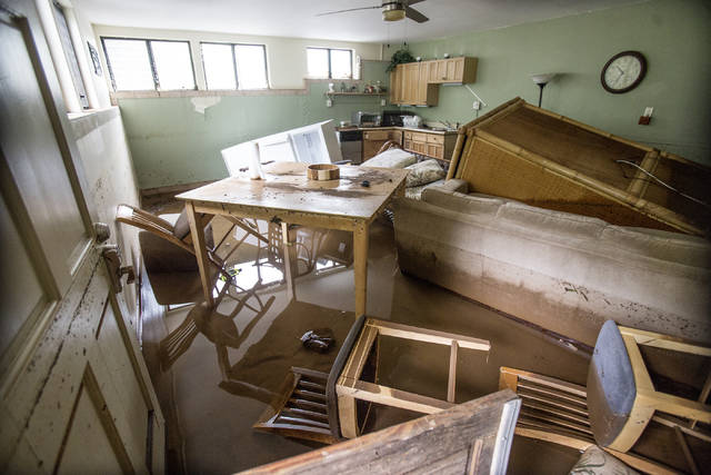 HOLLYN JOHNSON Tribune-Herald The lower level of the Todd residence was flooded near Papaikou