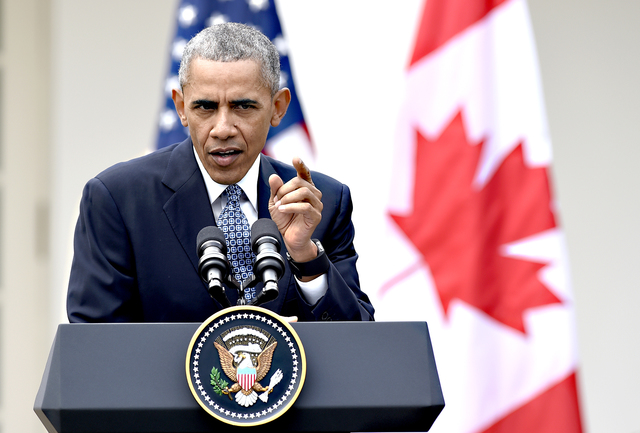 3111525_web1_Obama-US-Canada_Chri.jpg