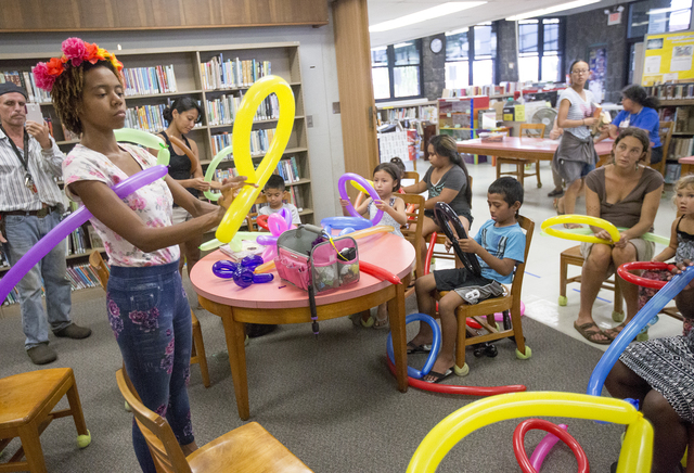 4327275_web1_Balloon_Twisting_at_the_Library_1.jpg