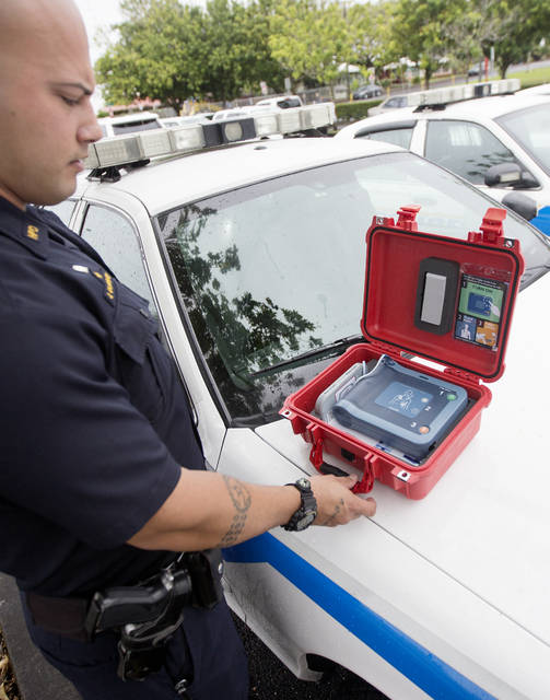 5186841_web1_Police_Cars_with_AED_Machine_2.jpg