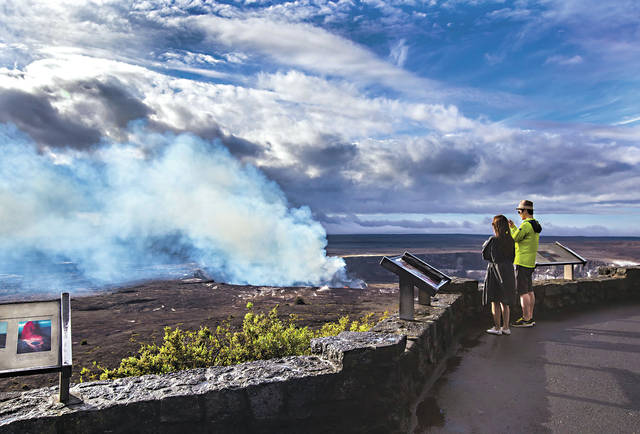5237748_web1_Visitors-observe-Kilauea-summit-lava-lake-from-Jaggar-Museum-observation-deck.jpg