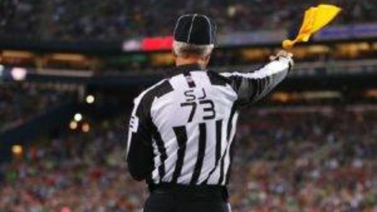 Image result for image of referee throwing flag