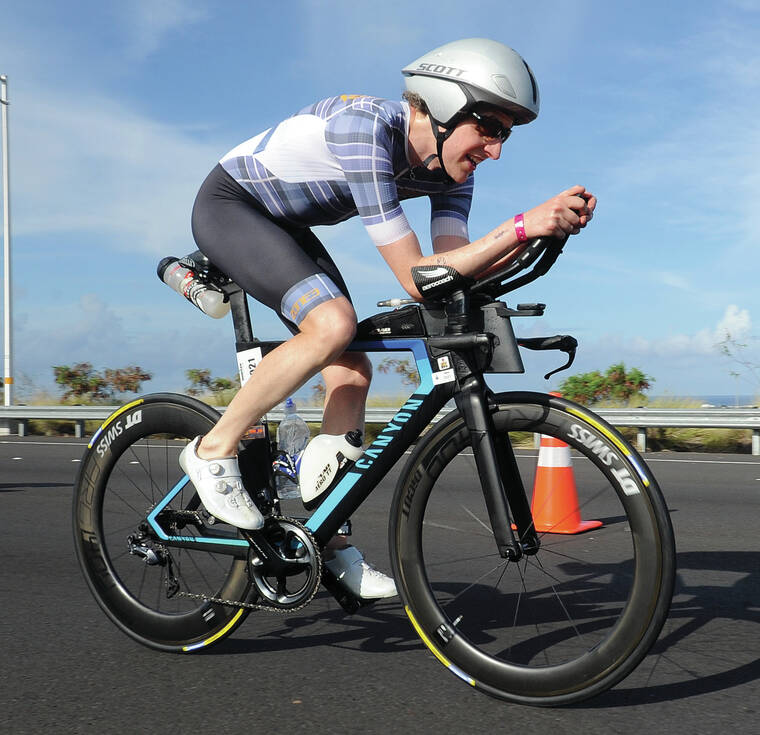 Gustav Iden sets new course record to claim Ironman World Championship