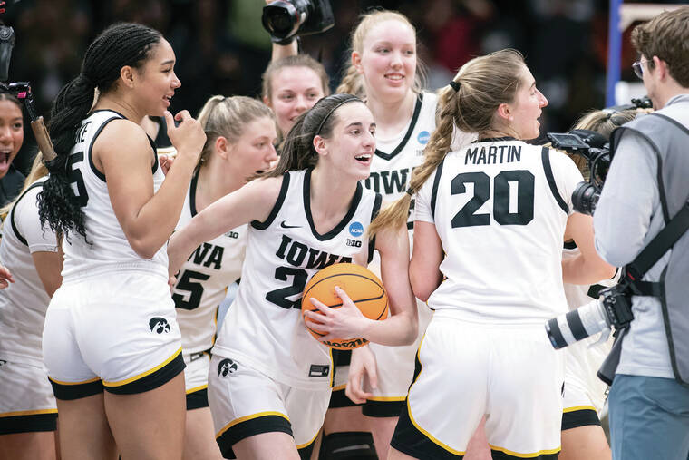 Unbeaten Gamecocks, Iowa’s Clark star in women’s Final Four Hawaii