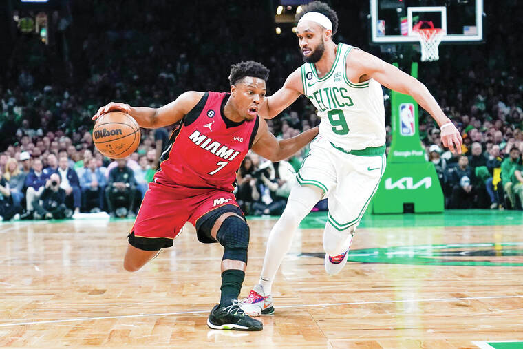 Butler, Lowry lead Heat over Celtics to stay in 1st