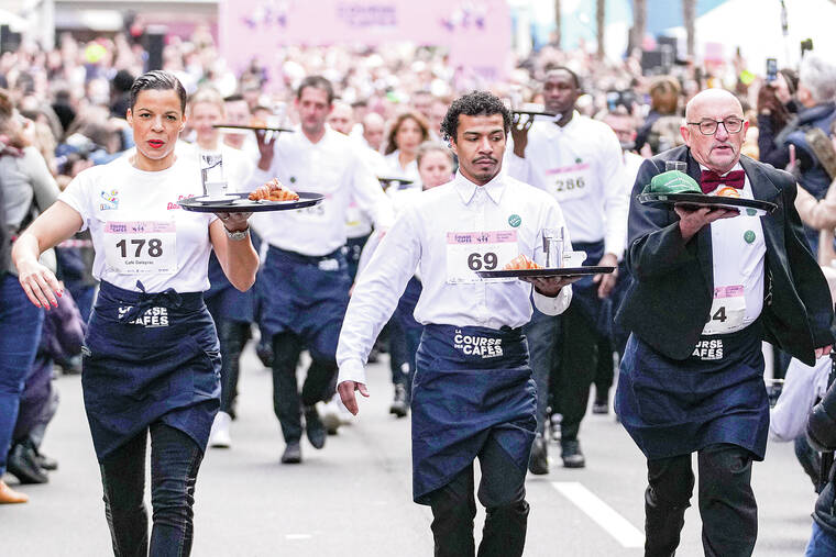 Olympics taster: Paris race celebrates the waiters and waitresses who nourish city’s life and soul