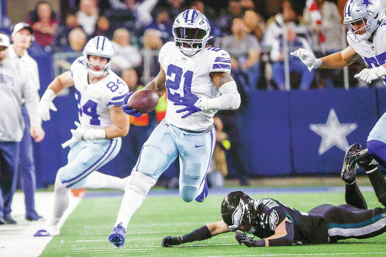 Cowboys and running back Ezekiel Elliott reuniting after agreeing to deal, AP source says