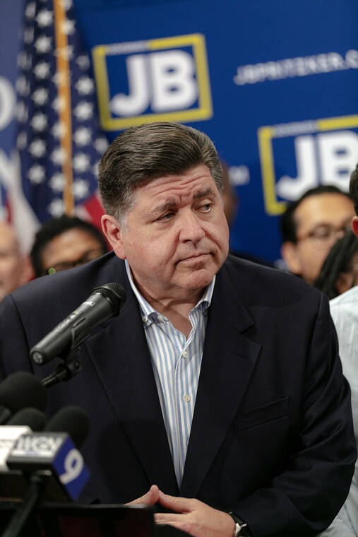 Illinois governor signs bill imposing new limits on immigration enforcement